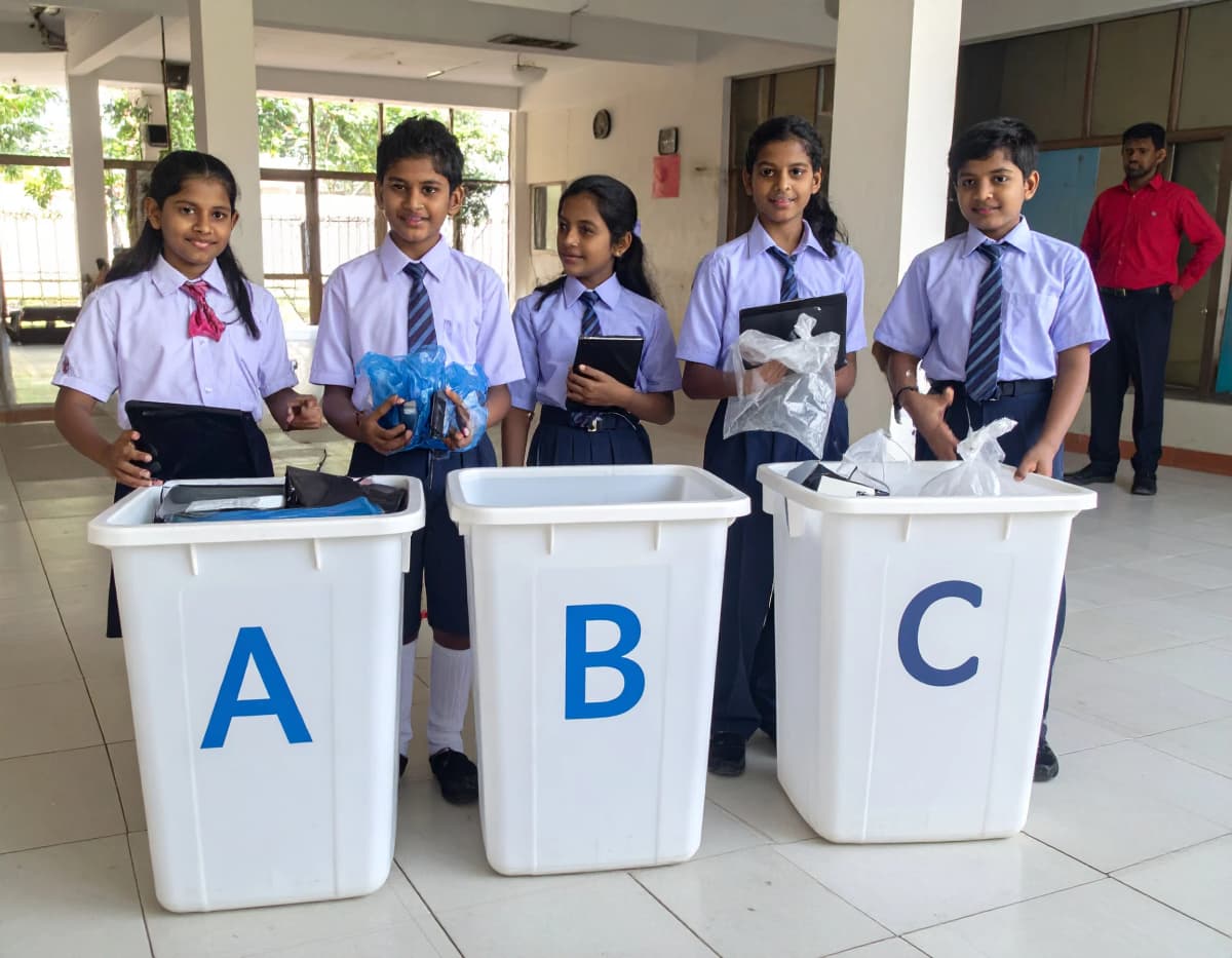 Students collecting e-waste